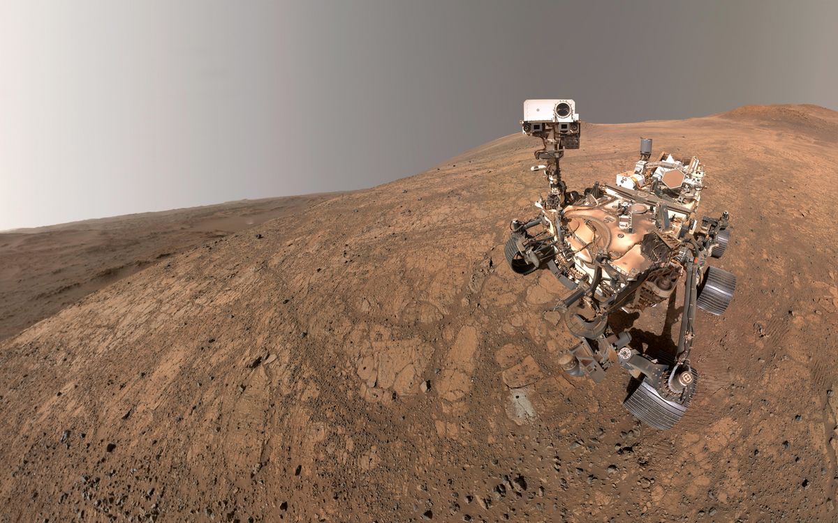 A self-portrait captured by NASA's Perseverance rover while traversing Mars' rocky surface.
