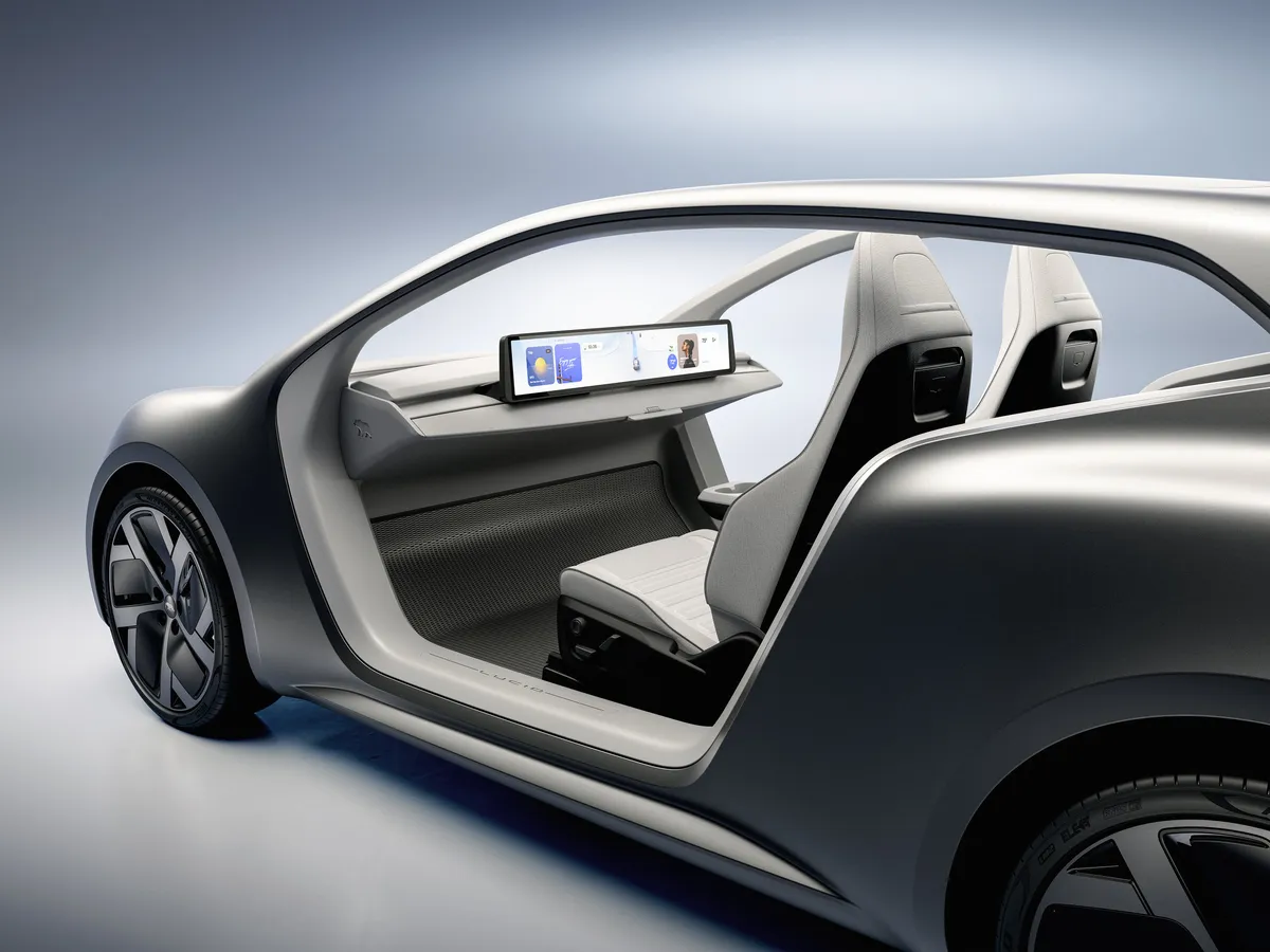 A two-seat electric vehicle without doors.